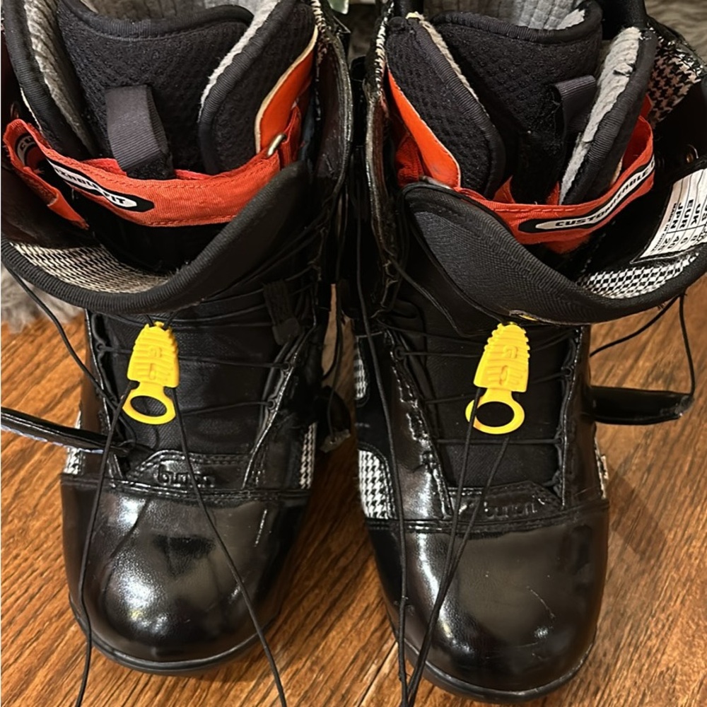 Burton Black Snowboard Boots with Orange Liner and Yellow Lace Pulls